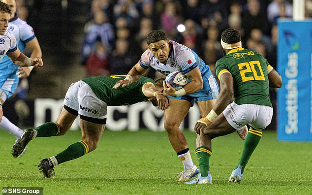 91914639-14066463-Captain_Sione_Tuipulotu_says_Scotland_are_getting_closer_to_topp-a-2_1731286712199.jpeg