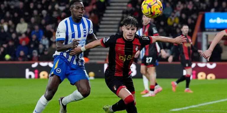 afc-bournemouth-s-milos-kerkez-in-action-with-brighton-hove-albion-s-danny-welbeck.JPG