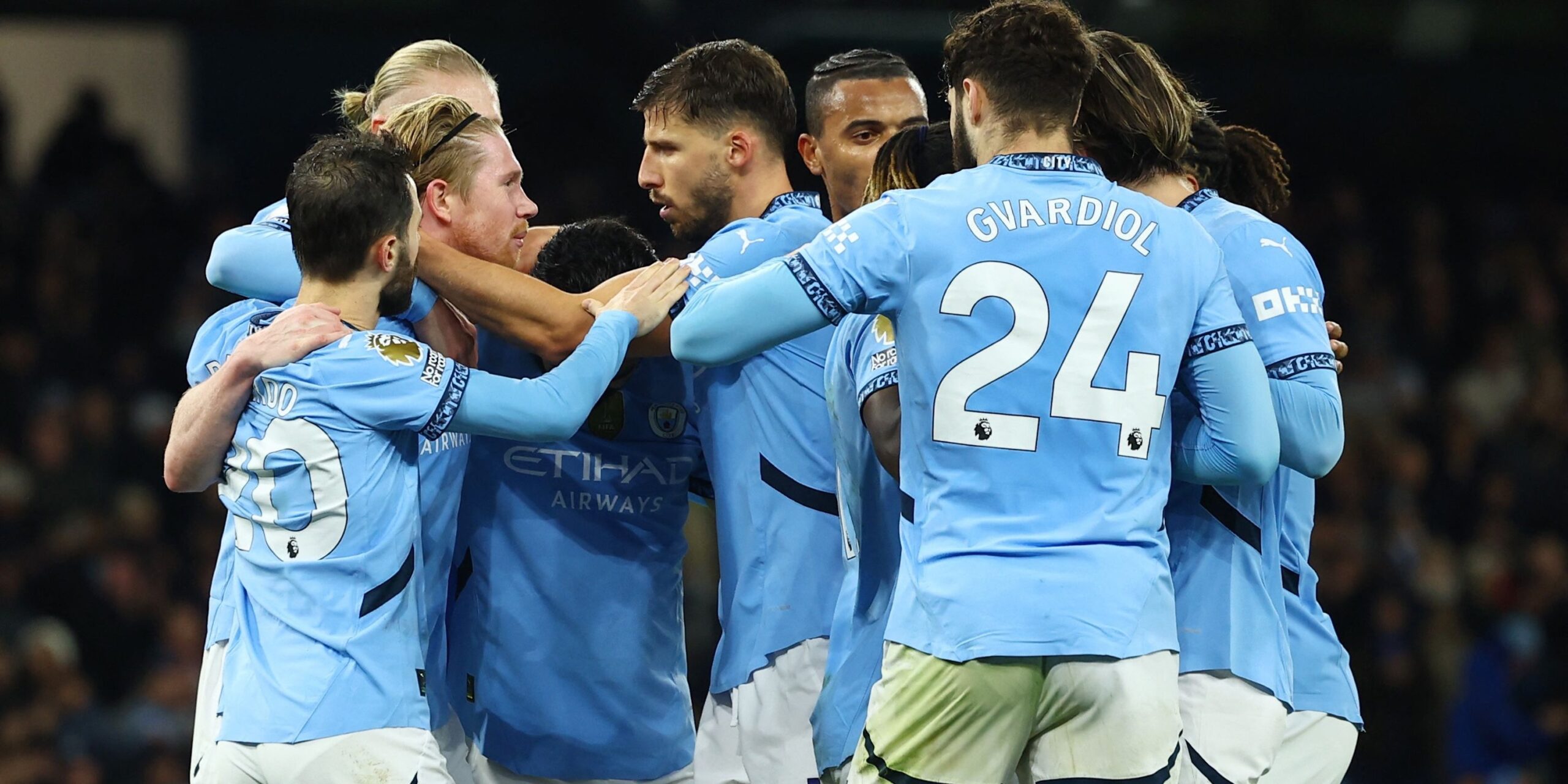 manchester-city-s-kevin-de-bruyne-celebrates-scoring-their-second-goal-with-teammates.JPG