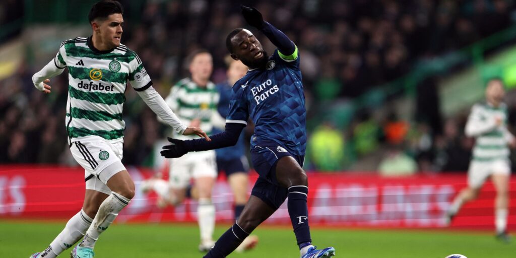 feyenoord-s-lutsharel-geertruida-in-action-with-celtic-s-luis-palma.JPG