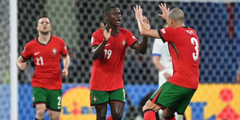 portugal-s-nuno-mendes-and-pepe-celebrate-their-first-goal.JPG