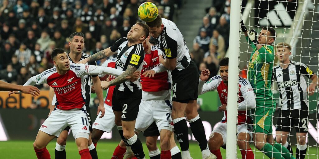 arsenal-s-gabriel-martinelli-in-action-with-newcastle-united-s-kieran-trippier-and-sven-botman.JPG