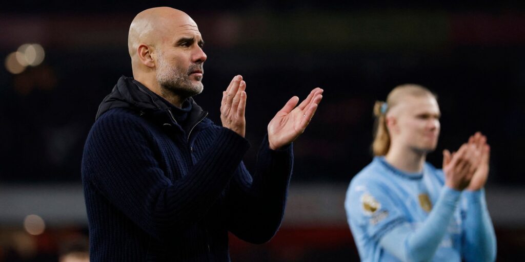 manchester-city-manager-pep-guardiola-and-erling-haaland.JPG