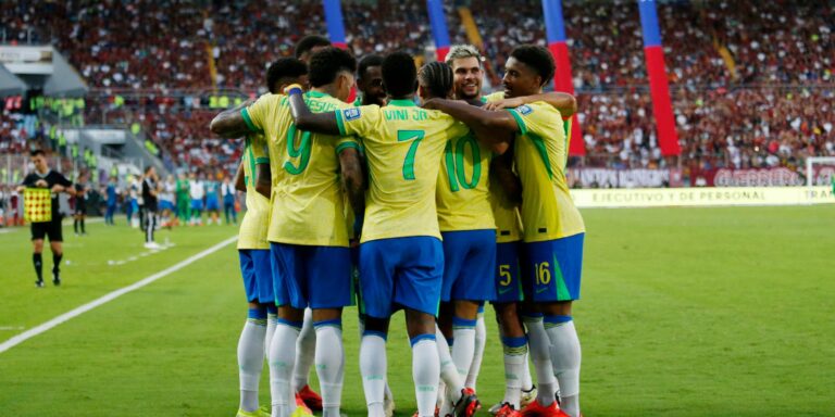 brazil-s-raphinha-celebrates-scoring-their-first-goal-with-teammates.JPG