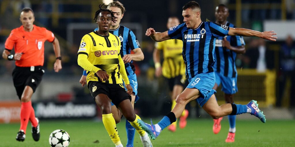 borussia-dortmund-s-jamie-bynoe-gittens-in-action-with-club-brugge-s-ferran-jutgla.JPG