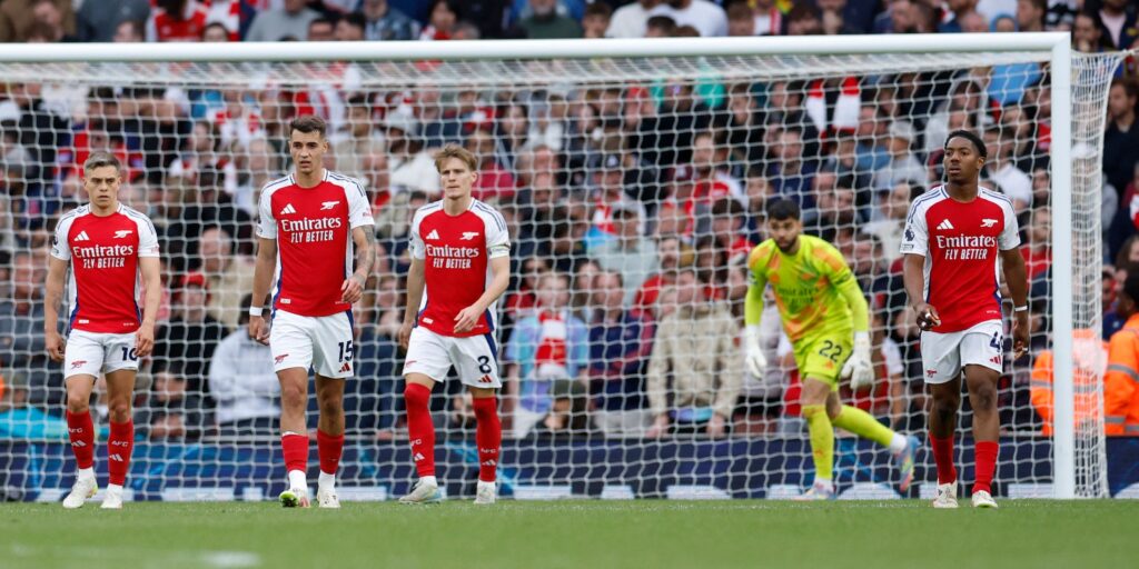 arsenal-s-jakub-kiwior-with-teammates-look-dejected-after-afc-bournemouth-s-evanilson-scores-their-s.jpeg