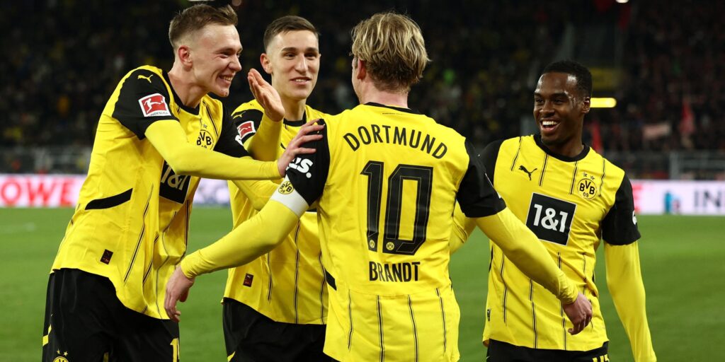 borussia-dortmund-s-julian-brandt-celebrates-scoring-their-third-goal-with-jamie-bynoe-gittens-and-t.jpeg