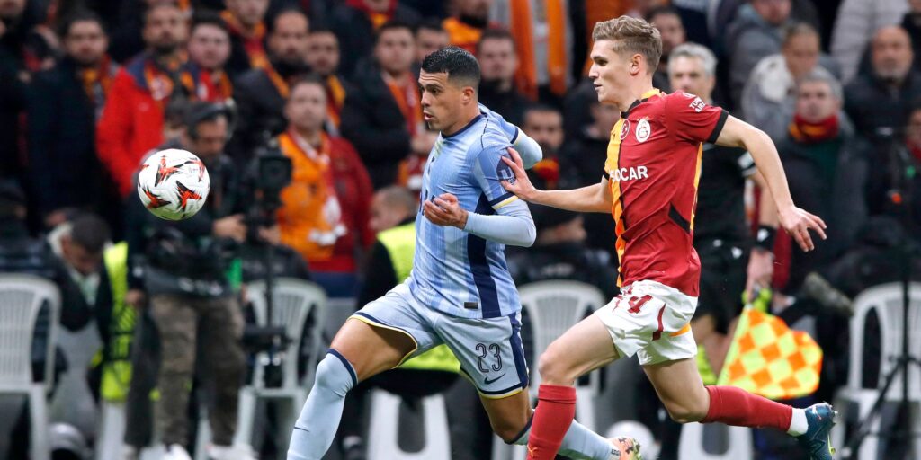 tottenham-hotspur-s-pedro-porro-in-action-with-galatasaray-s-elias-jelert.JPG