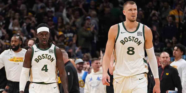 Boston-Lets-Go-of-Holiday-and-Porzingis.jpg