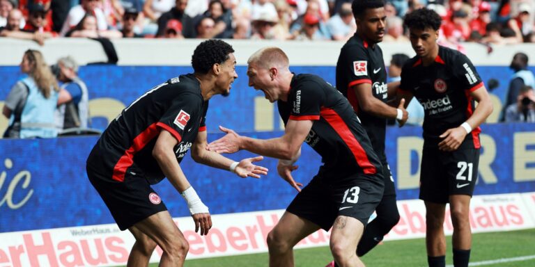 eintracht-frankfurt-s-rasmus-kristensen-celebrates-their-third-goal-with-hugo-ekitike.JPG