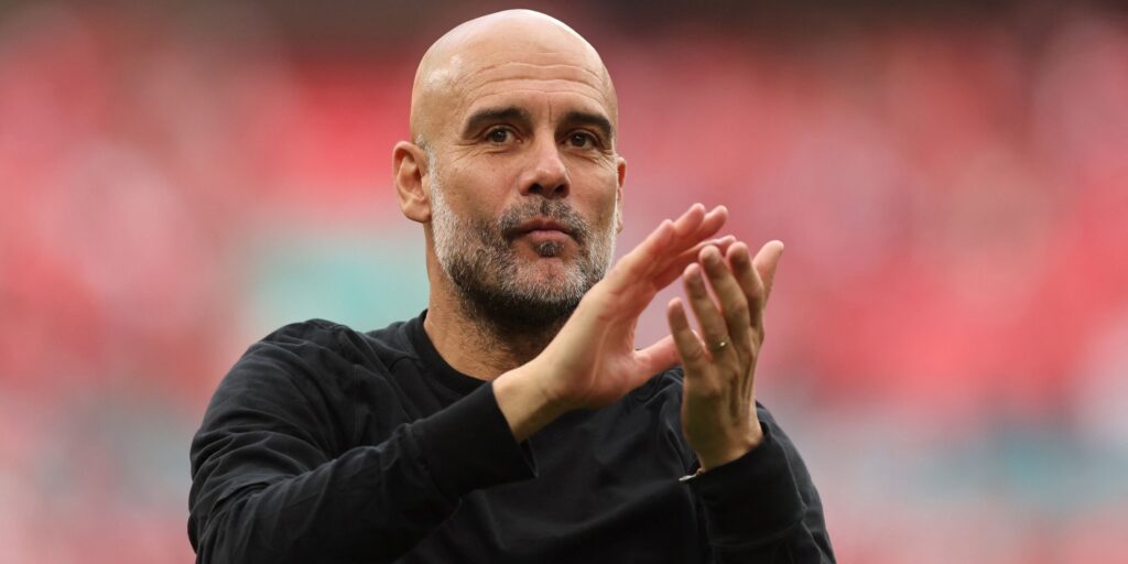 manchester-city-manager-pep-guardiola-applauds-fans-after-the-match.JPG
