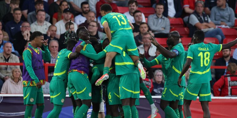 senegal-s-habib-diarra-celebrates-scoring-their-second-goal-with-with-teammates.JPG