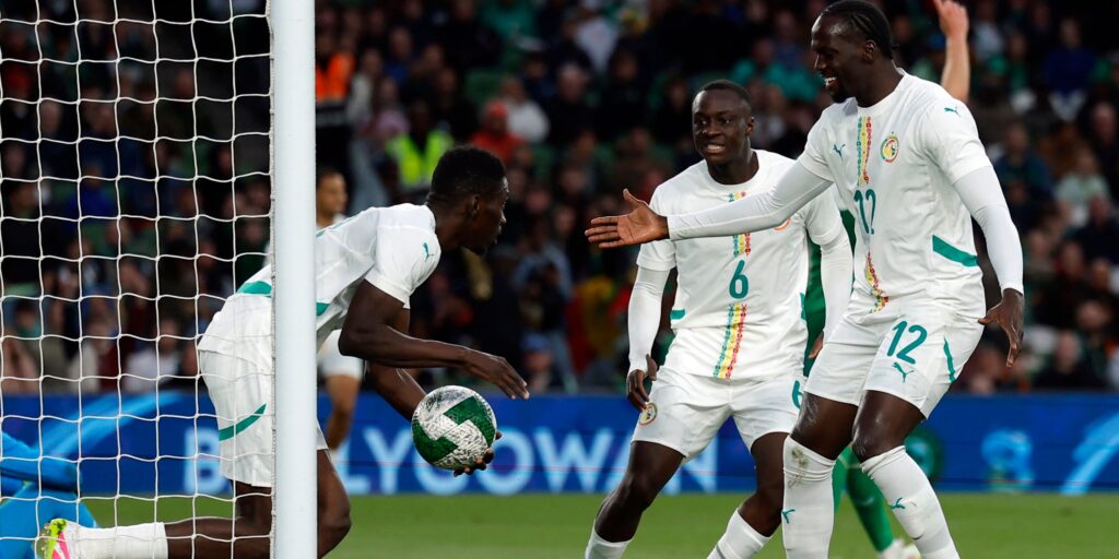senegal-s-ismaila-sarr-celebrates-with-habib-diarra-and-cherif-ndiaye-after-scoring-their-first-goal.jpeg