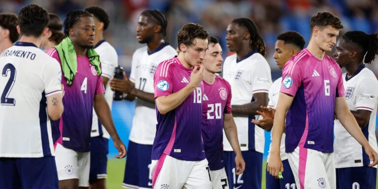 germany-s-rocco-reitz-and-germany-s-eric-martel-look-dejected-after-the-match.JPG